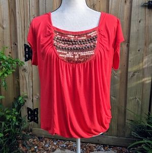 Red top with sequined bodice